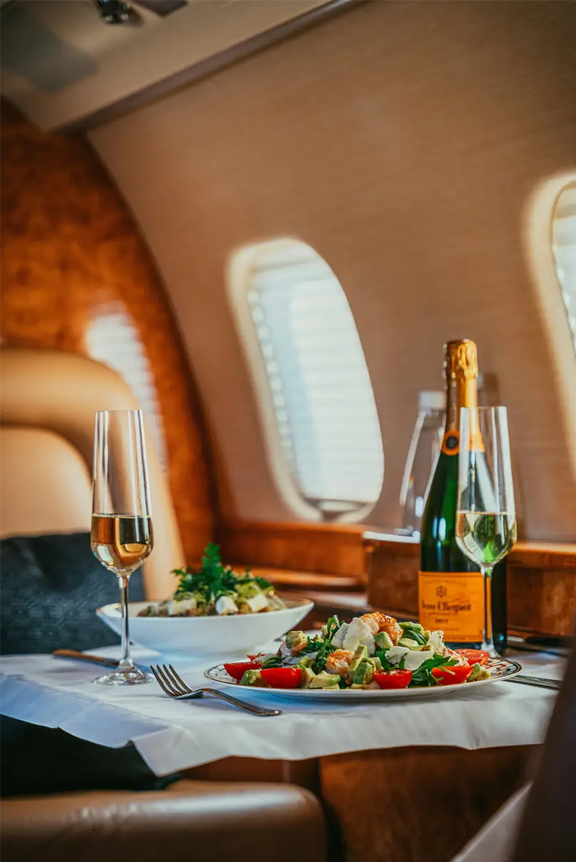 dinner and champagne on a private jet