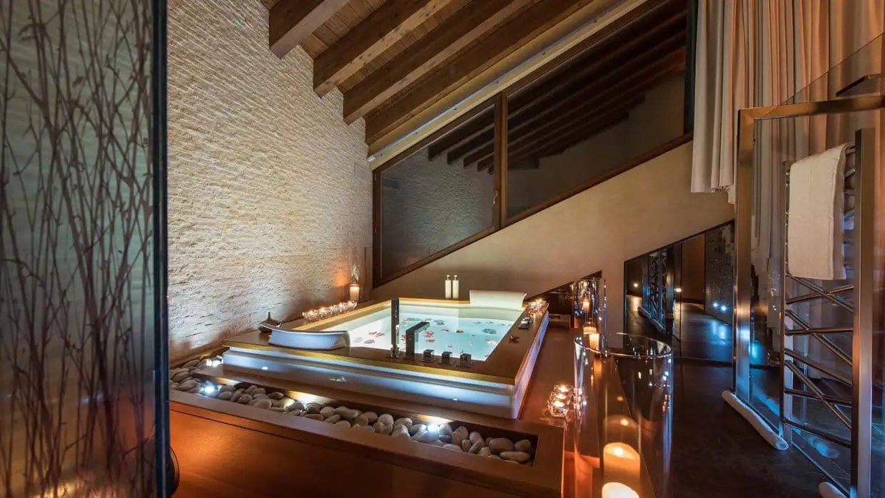 candlelit indoor hot tub