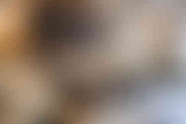 A couple lounging in chalet living room