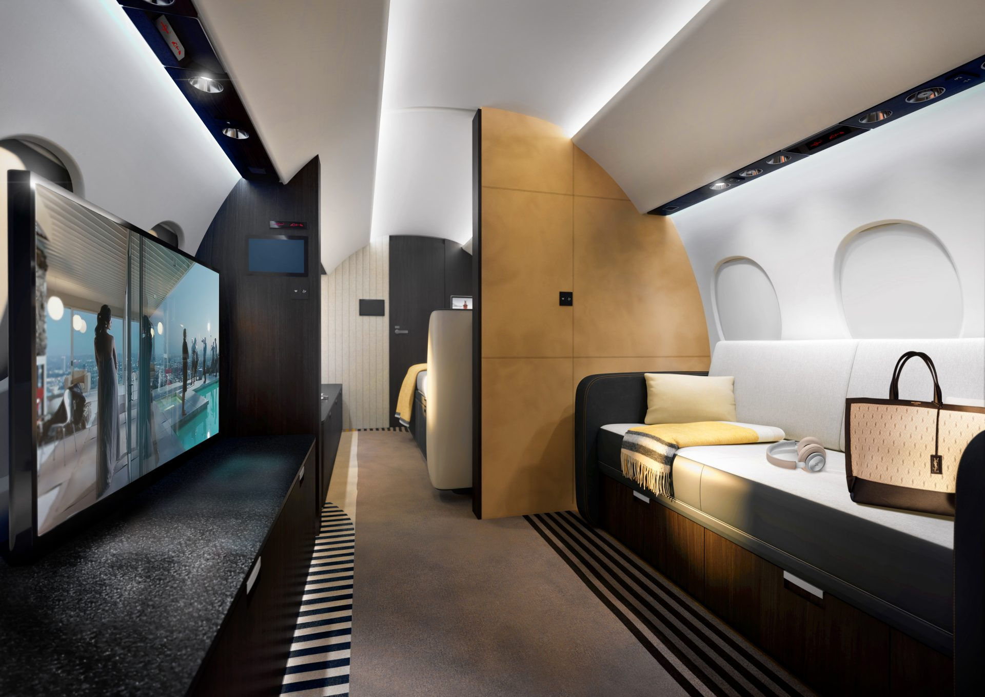Dassault Aviation Falcon 10X business jet  living area with sofa and tv