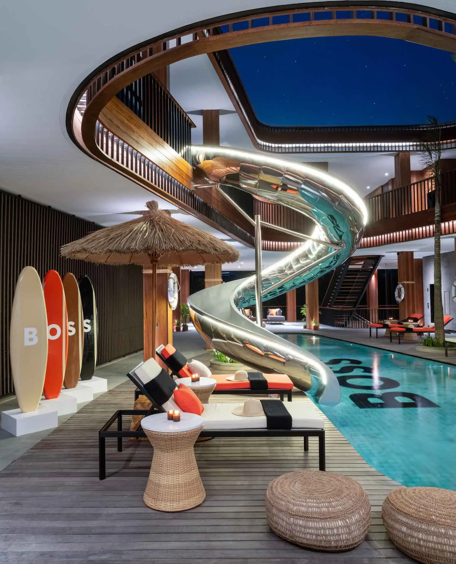 Swimming pool and sun loungers at Boss House Bali, Indonesia