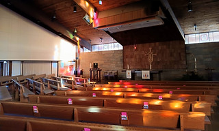 Interior photo of Prince of Peace with empty pews