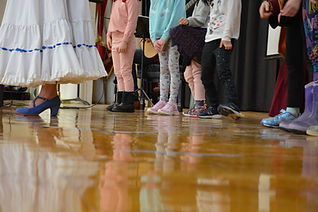 Children learning as part of Music & Dances from the Spanish Americas, a program by Hispanic Culture Arts