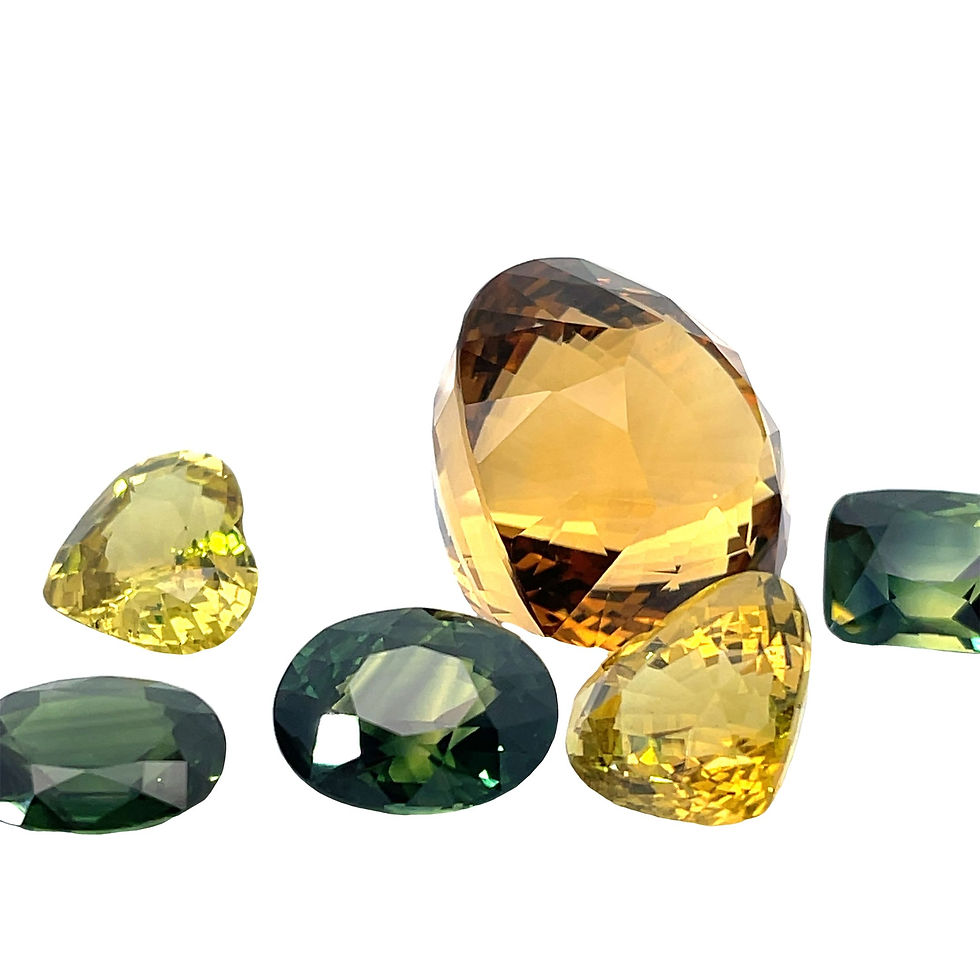 High angle view of loose Sri Lankan gemstones arranged by color