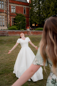 A bride dances at Frensham Hall Weddings