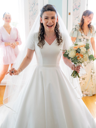 An excited bride before her ceremony at Frensham Hall Weddings