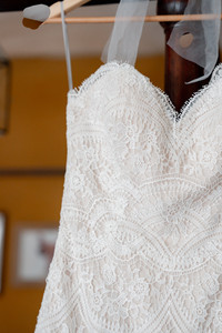 A close up of the lace on a bridal dress