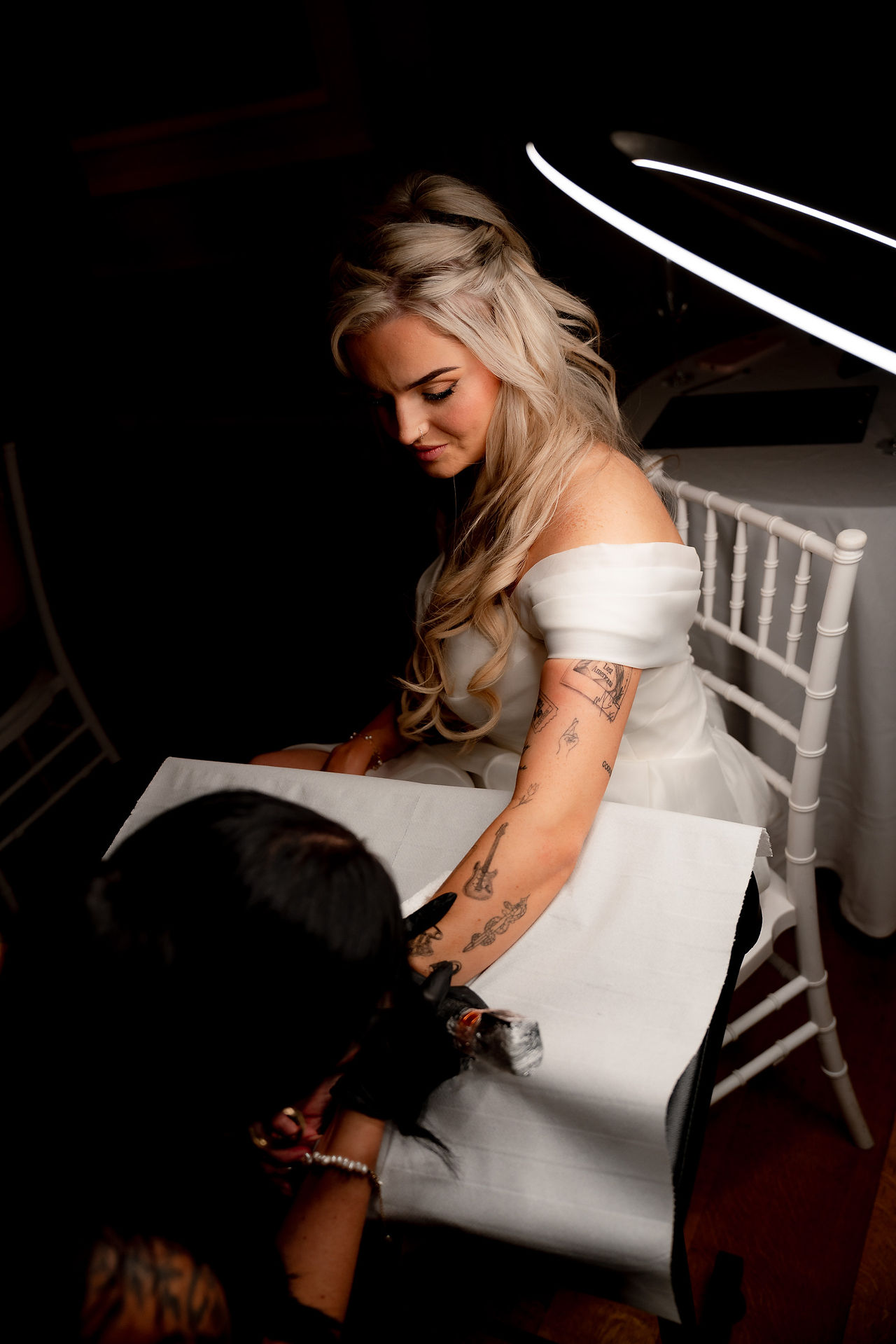 Chloe getting a tattoo on her wedding day 