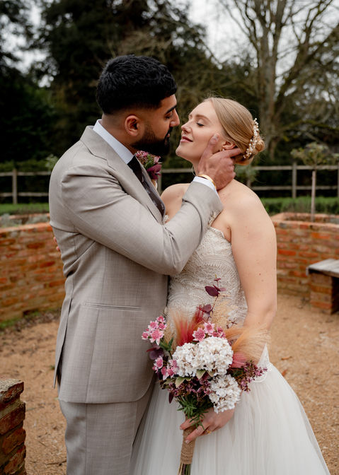 A couple share a kiss at Shaw house 
