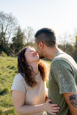 A couple in a field, romantic 