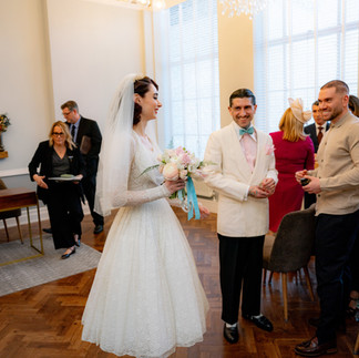 A couple getting married in Room 99 at Islington Town Hall