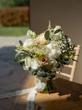 Floral bouquet for a bride and Millbridge Court