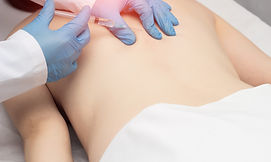 Canva - Doctor injects trigger points on