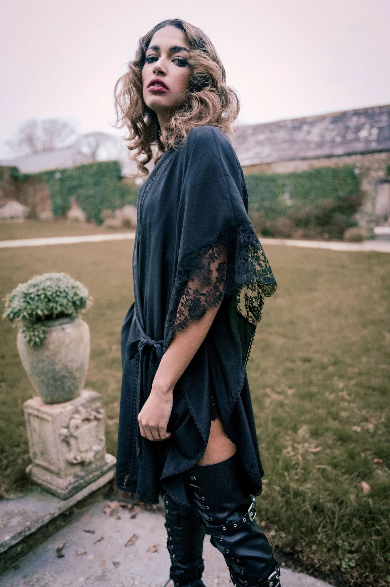 Shell Belle Florence Black Kimono lifestyle with boots, side view