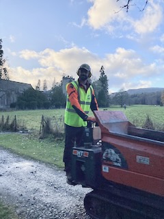 Adam operating the mechanical barrow