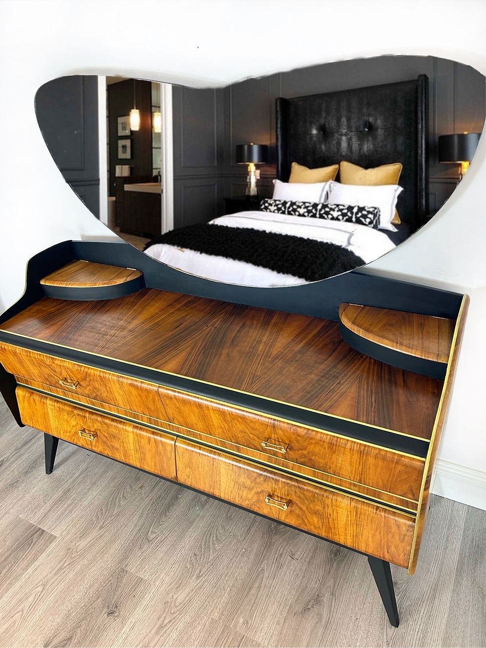 Thumbnail: Black and gold Art Deco dressing table styled in a bedroom, showcasing curved mirror and elegant silhouette