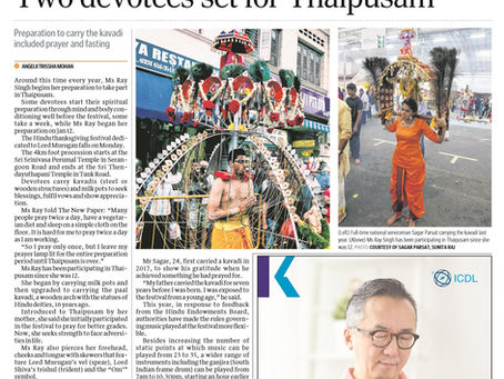 Two devotees prepare for Thaipusam