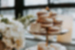 French macarons for a wedding dessert table with gold leaf applied