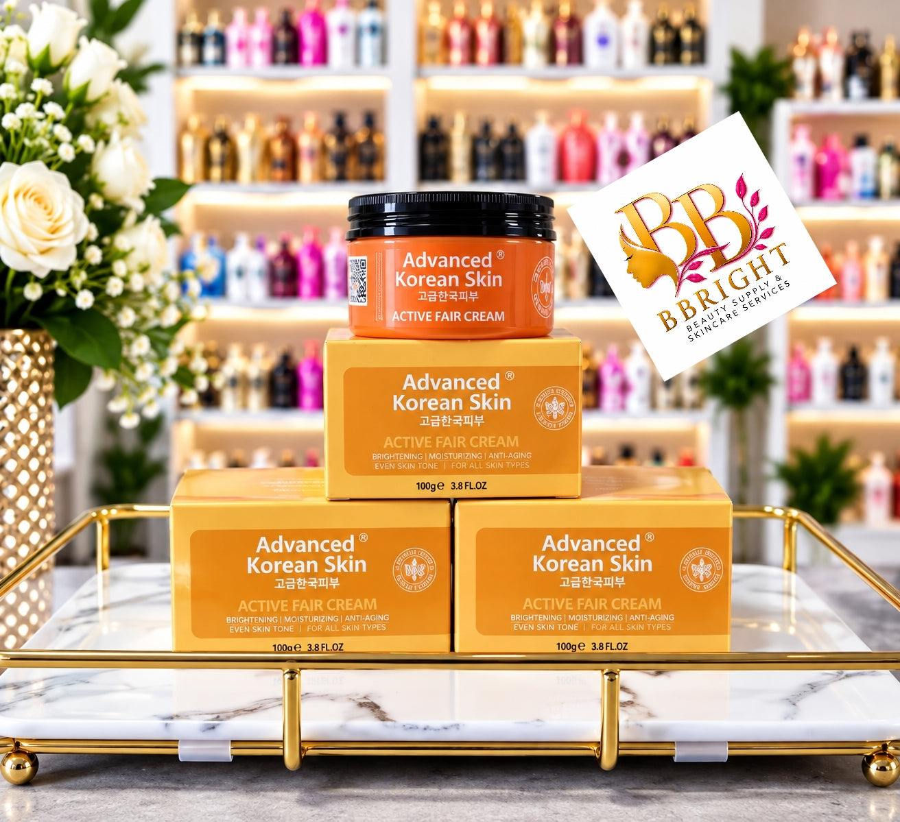 Advanced Korean Skin brightening face moisturizer in orange packaging with black lid stacked on matching orange boxes