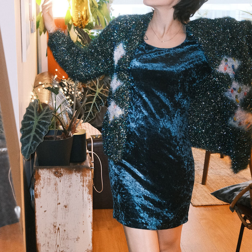 Thumbnail: Emerald green velvet dress