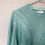 Thumbnail: Pastel green sweater