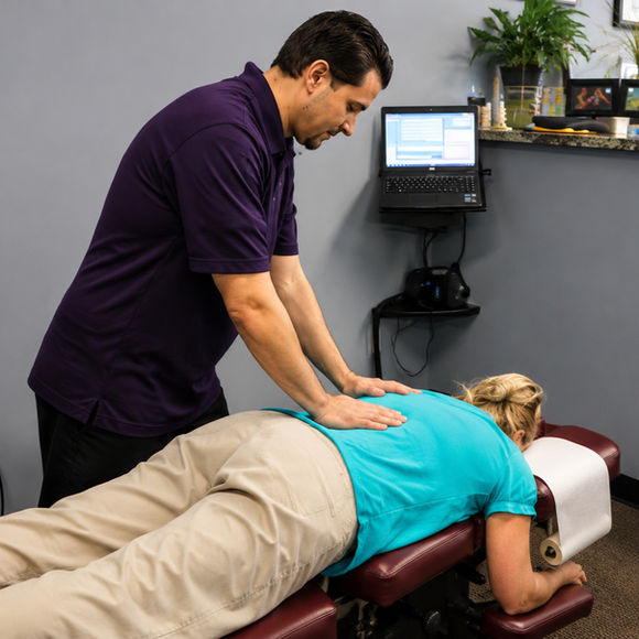 Dr. Gary Hagner providing chiropractic care to a patient at Balanced Body Chiropractic, St Peters, MO