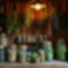 old worldy apothecary, jars of herbs, hanging dried herbs, cosy yet mystical.jpg