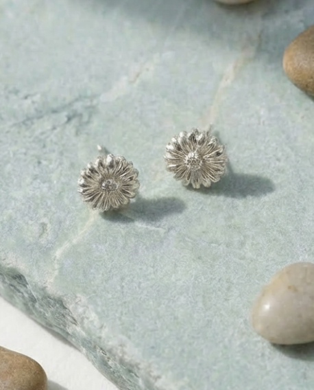 Iti Flora hand carved sterling silver daisy stud earrings, 4mm, no two pairs identical, handmade in New Zealand