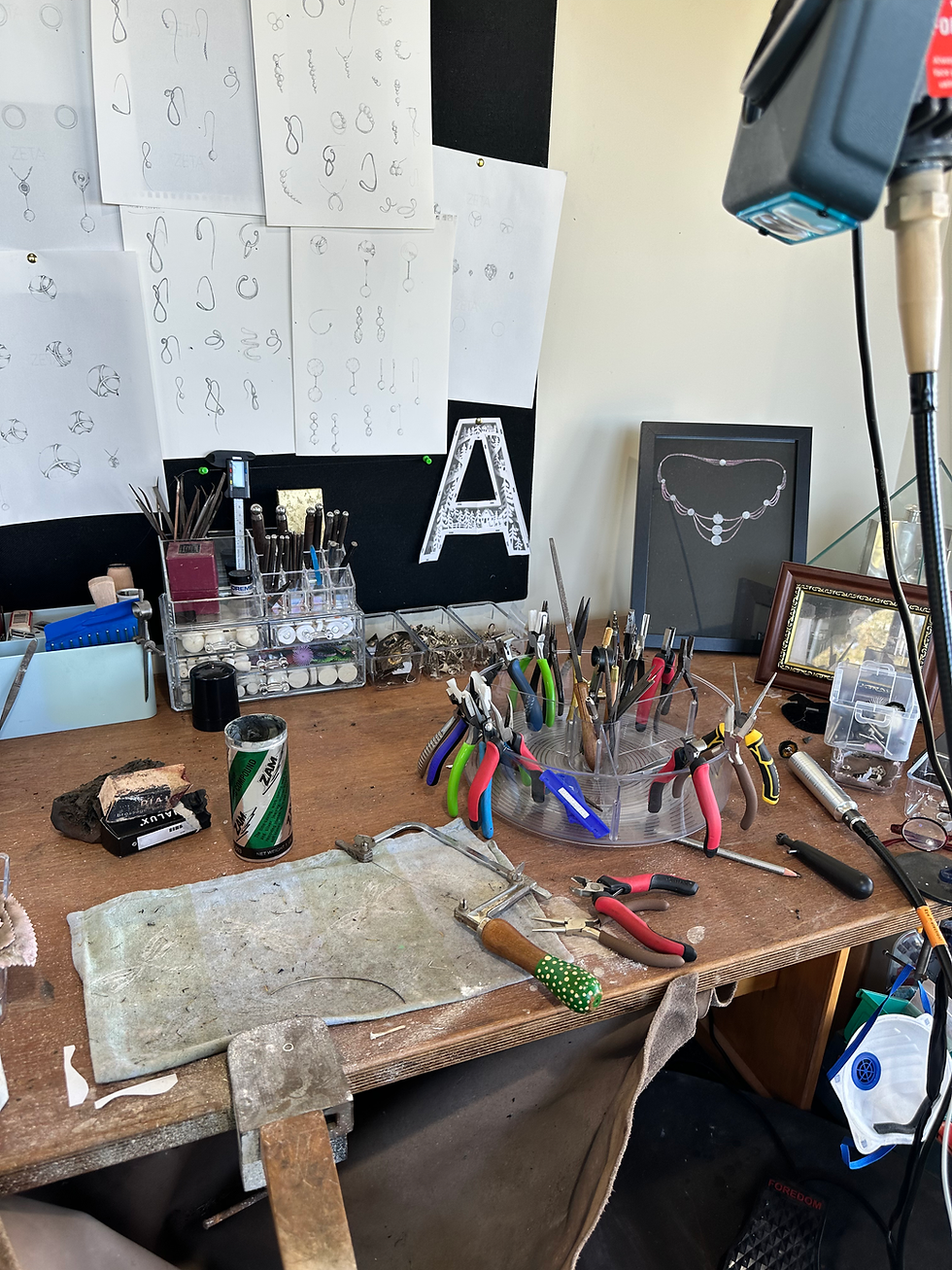 Handmade silver and gold jewellery being made at the bench by Sue Dunmore, Porini Design Studio, Tararua District, New Zealand.