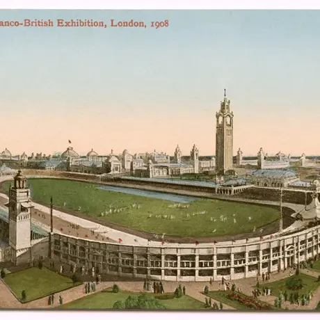 A drawing of an oval shaped stadium with a green infield and a bell toward in the background