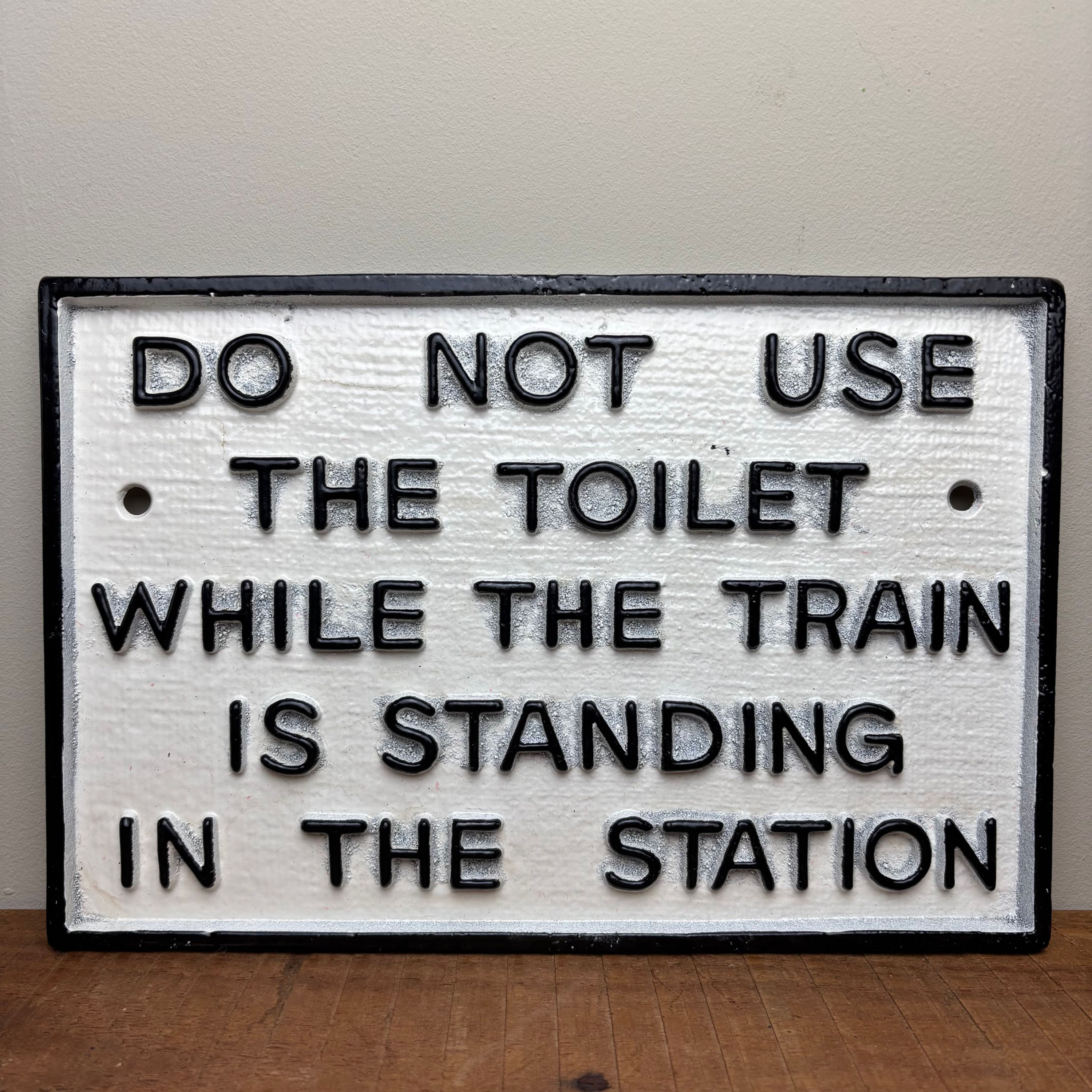 Train Station Toilet Sign