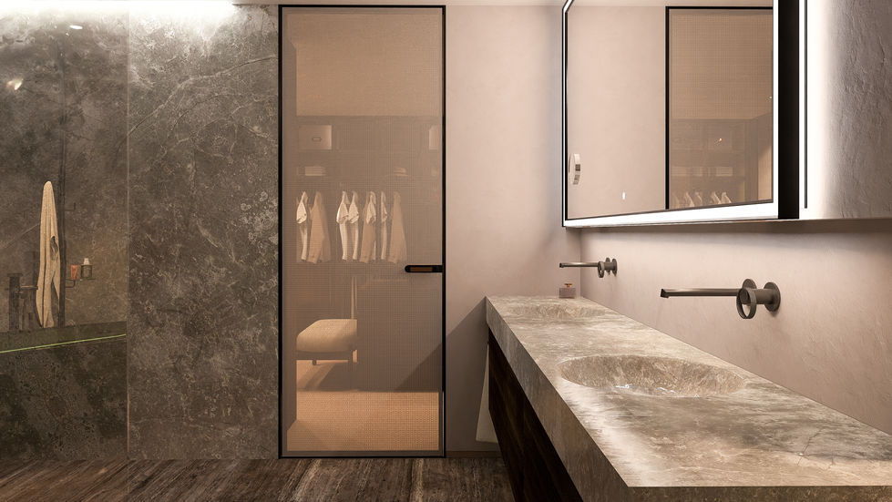 Custom natural stone vanity with carved basins, wall-mounted fixtures, illuminated mirror, and luxury contemporary bathroom detailing.