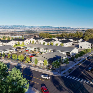 Commercial development rendering of The Adelynn in Delta, Colorado, featuring contemporary multi-tenant architecture, pedestr