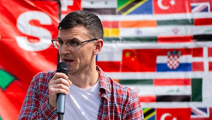 Adam Coutts MC and host of company event