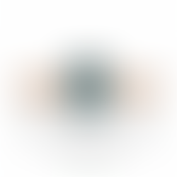 Rose gold ring with an oval blue gemstone and diamond-accented twisted band, set against a white background. Elegant and luxurious design.