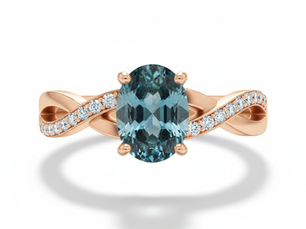 Rose gold ring with an oval blue gemstone and diamond accents on a twisted band, set against a white background. Elegant and shiny.