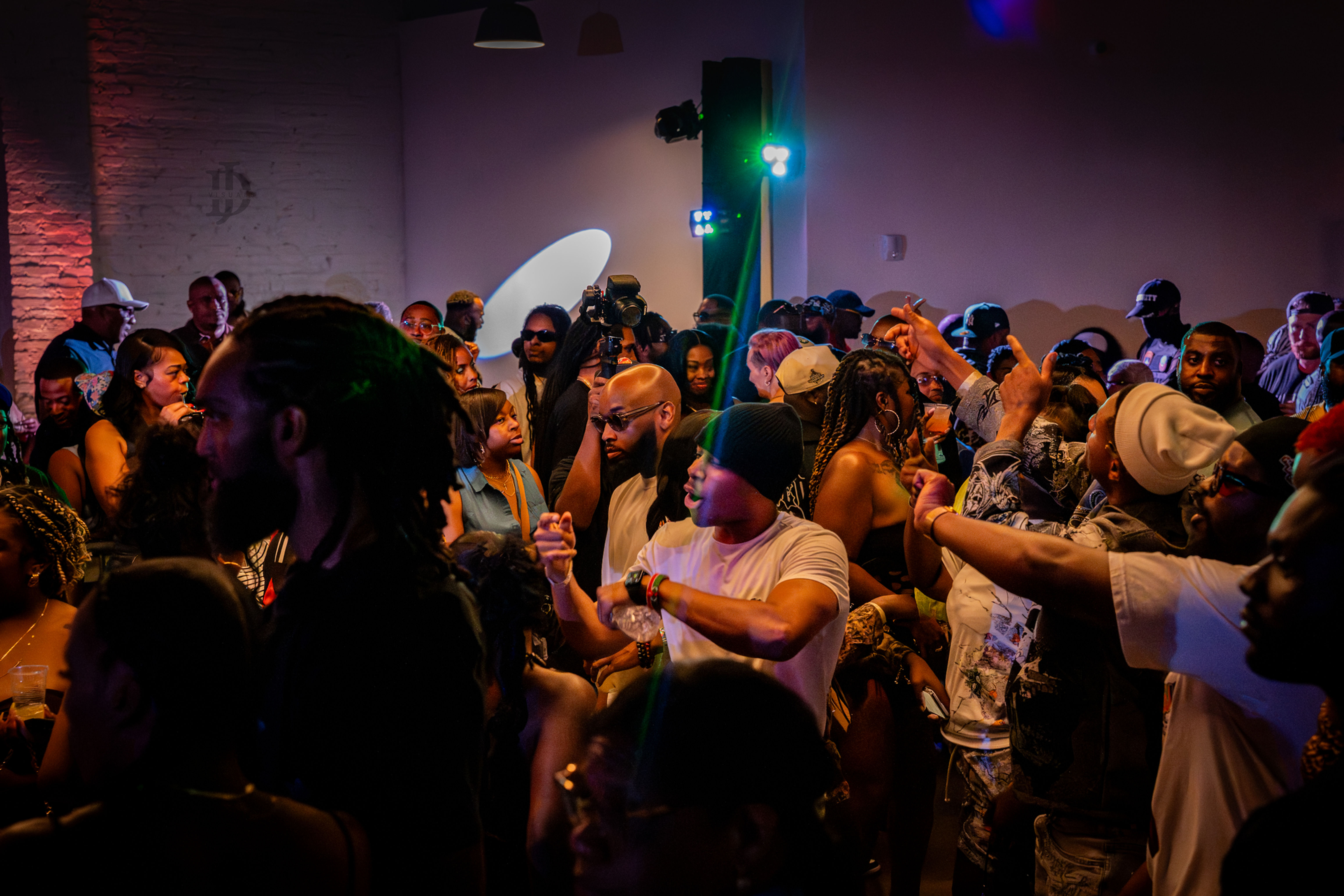 Crowd at a dimly lit event