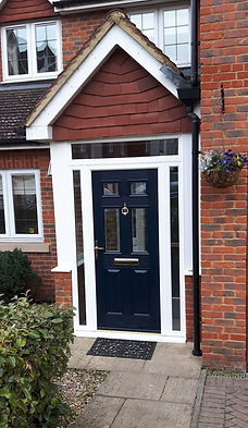 A new porch added to a home with an exiting front door roof