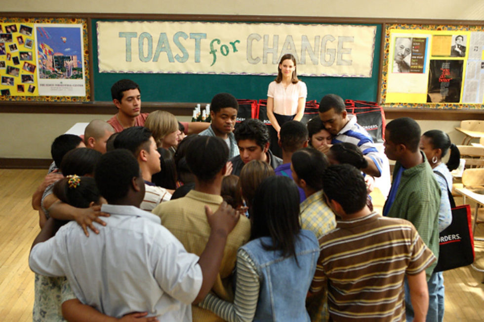 Eye-level view of a group of high school students engaged in a science experiment