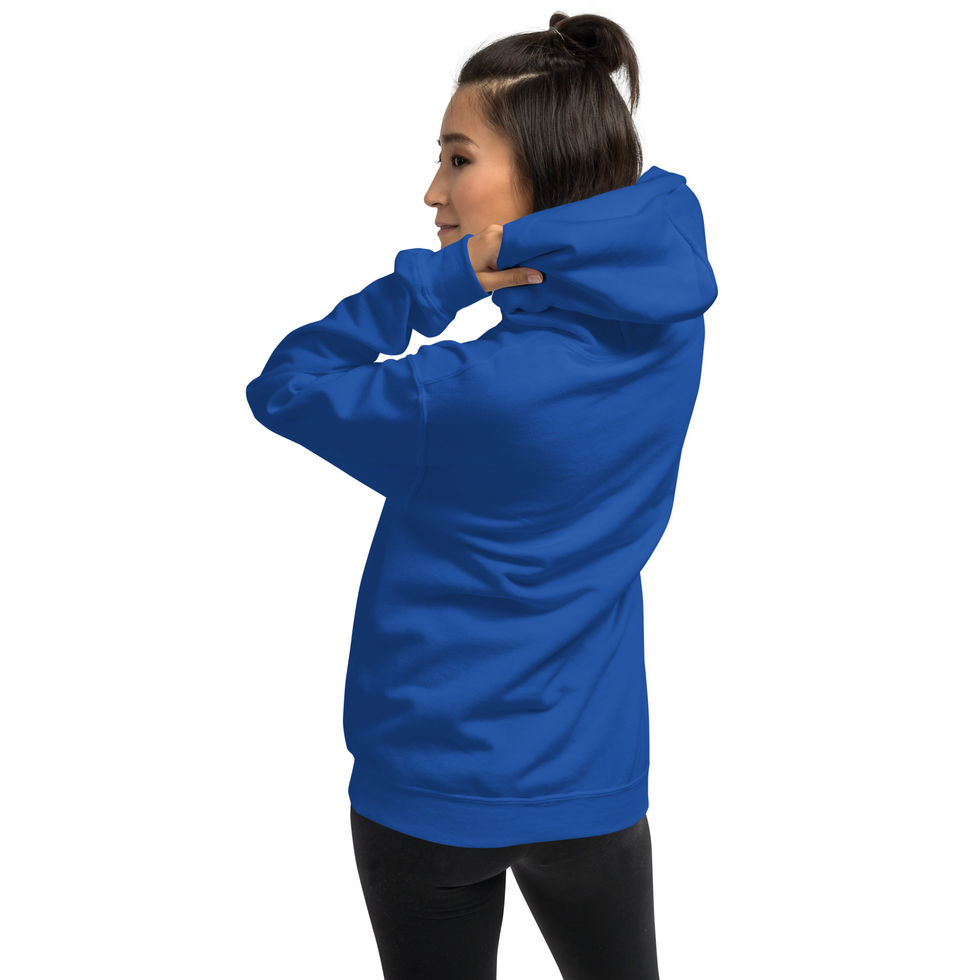 Woman wearing a blue hoodie and black pants indoors. Stylish and comfortable.