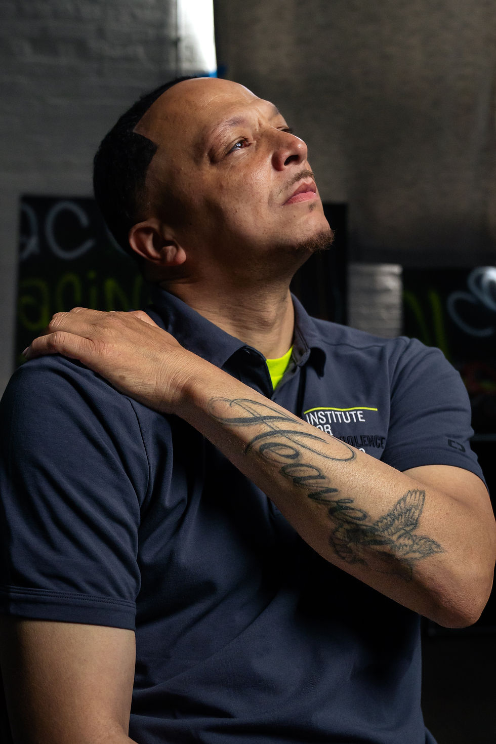 Illinois Peace Project participant photographed wearing a dark shirt