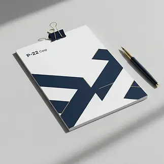 P-22 Corp, black and white notepad with pen, paper clip. Reliable Government Solutions.
