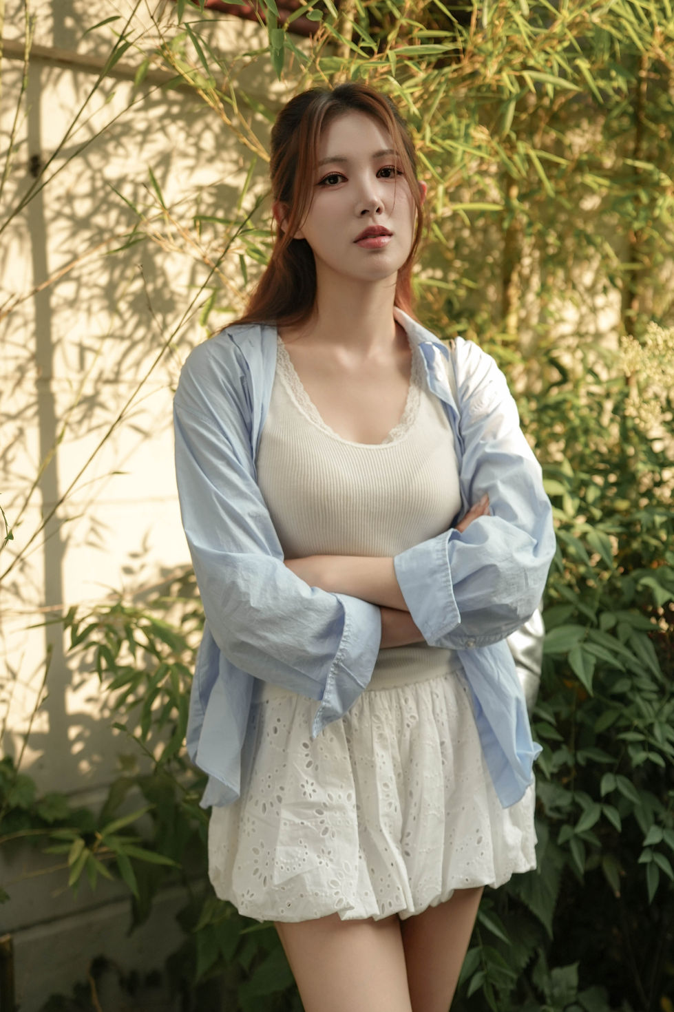 An emotional portrait of a woman taken in natural light in Yeonhui-dong.