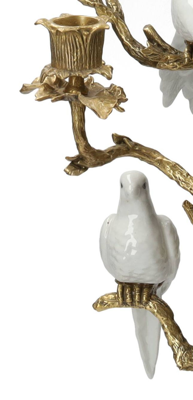 bronze and porcelain candle stick holder on a black marble pedestal - Christmas