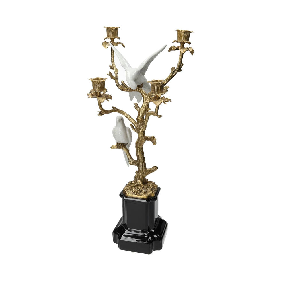 bronze and porcelain candle stick holder on a black marble pedestal - Christmas
