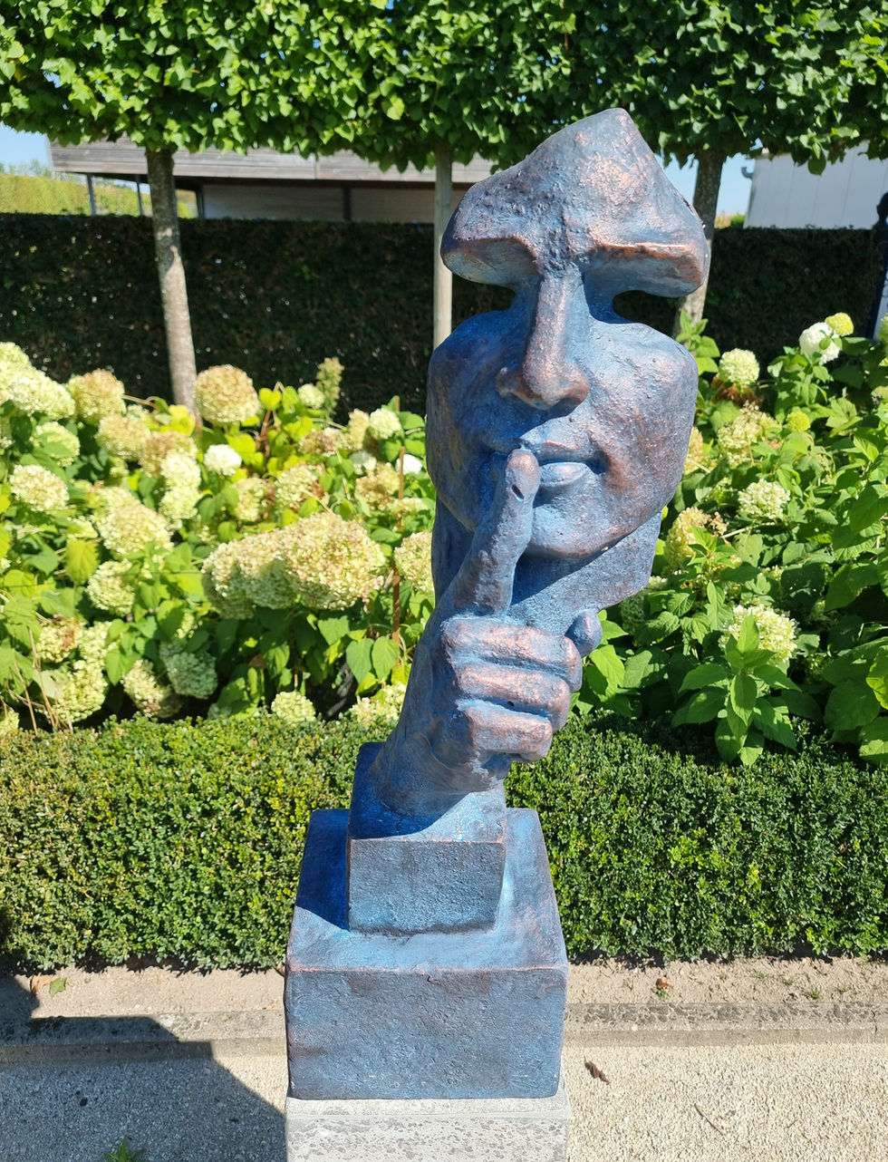 Statue of a man who is whispering - sculpture on a pedestal - garden decoration