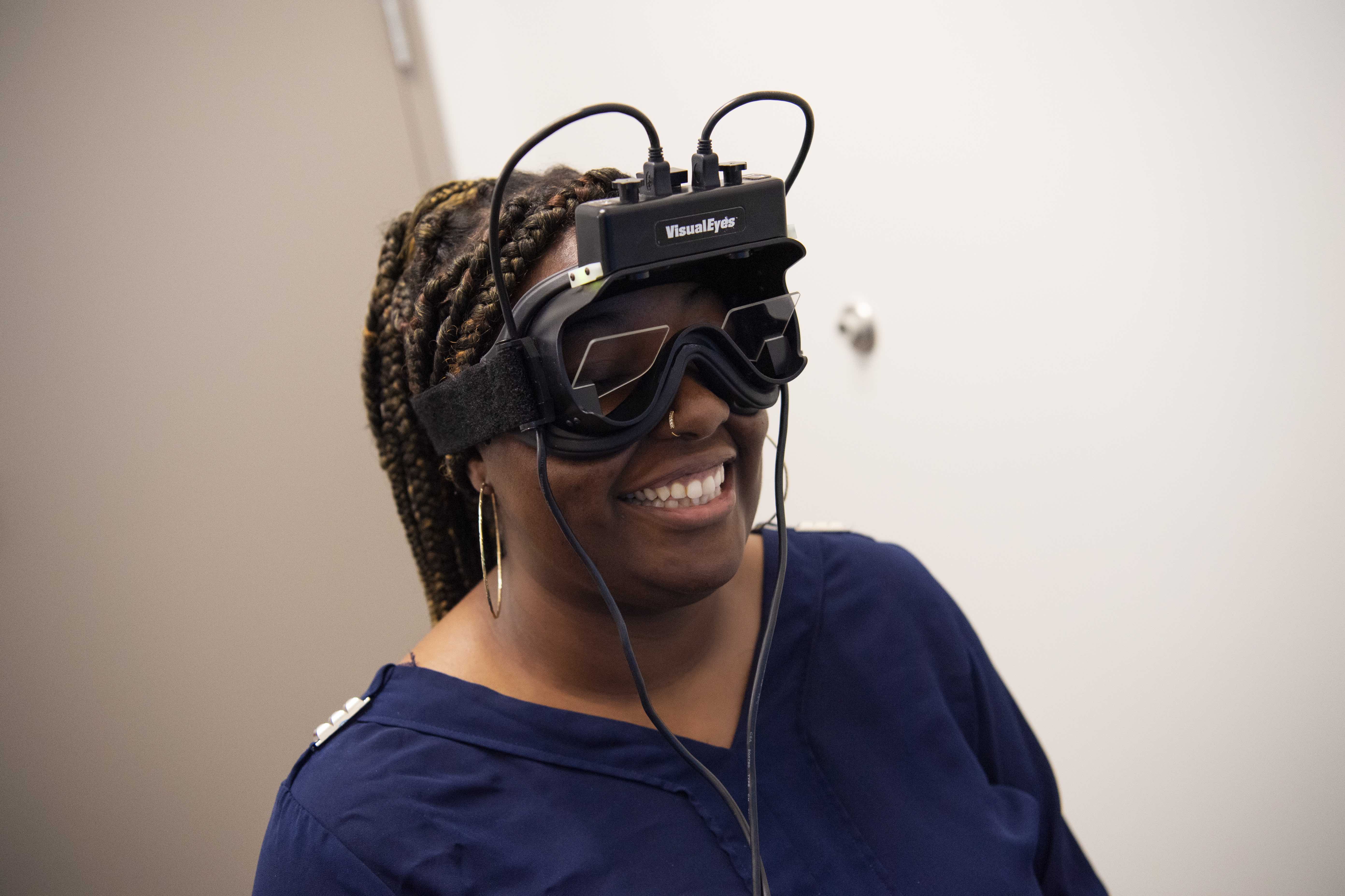 Patient wearing VisualEyes videonystagmography goggles during vestibular testing at Carolina Functional Neurology Center