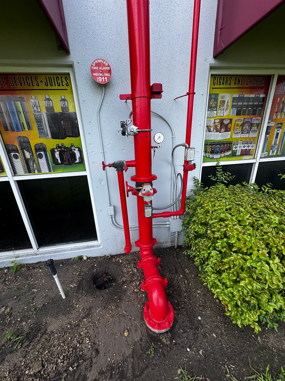 Certified backflow tester inspecting water valve