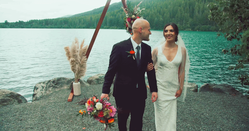 Bride and groom embracing outdoors