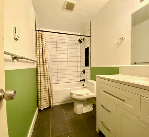 Bathroom remodel including new tile new vanity new flooring new paint 